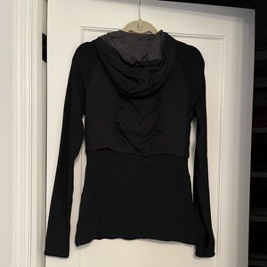 Lululemon black hooded jacket. Size 10. Great condition.